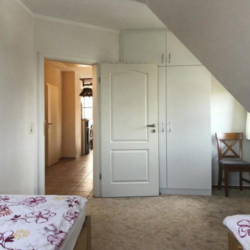 Ferienwohnung Ostseebad Wustrow · Noorderfeld OG · Schlafzimmer 2 mit 2 Einzelbetten